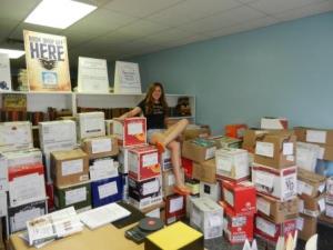 2011, compressed completion of epic book drive, christine and books Success Won't Wait volunteer Christine McNeill and just some of the 155 boxes destined for the schoolchildren of New Orleans!