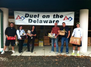 Success Won't Wait volunteers at the 2013 Duel on the Delaware Used Book Drive. Over 4,500 lbs. of books were collected at the annual event.