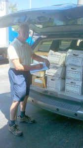 Larry Thurrell of the Friends of the Hockessin Library loads the van with over 750 books destined for the annual Used Book Sale!