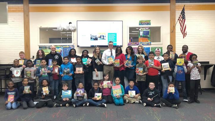 Delaware literacy organization Success Won't Wait donates alomost 500 books to Eisenberg Elementary. Vincenza Carrieri-Russo