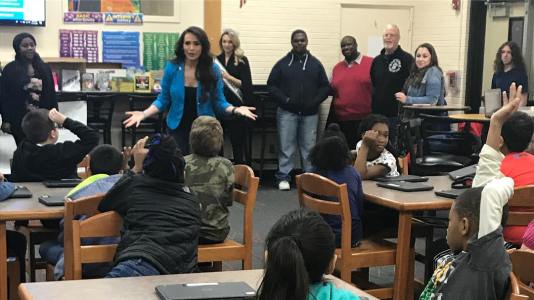 Delaware literacy organization Success Won't Wait donates alomost 500 books to Eisenberg Elementary. Vincenza Carrieri-Russo