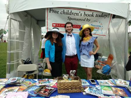 Manning the book giveaway are Success Won't Wait co-founders Susan McNeill (L) and Vincenza Carrieri-Russo (R) with long-time volunteer Matt McNeill.