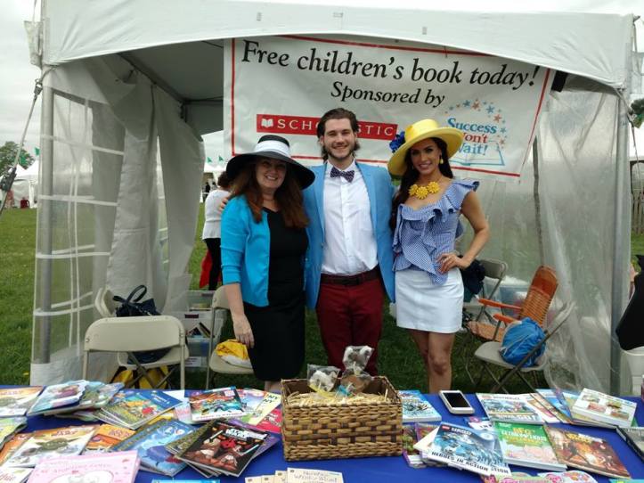 Manning the book giveaway are Success Won't Wait co-founders Susan McNeill (L) and Vincenza Carrieri-Russo (R) with long-time volunteer Matthew McNeill.