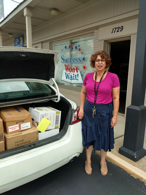 Success Won't Wait supports the Friends of the Wilmington Library with 500+ book donation