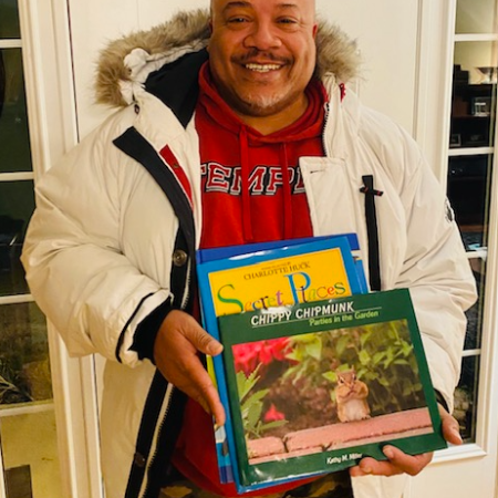 Success Won’t Wait Provides 100+ Books to A Helping Hand’s Adopt-a-Family Holiday Program